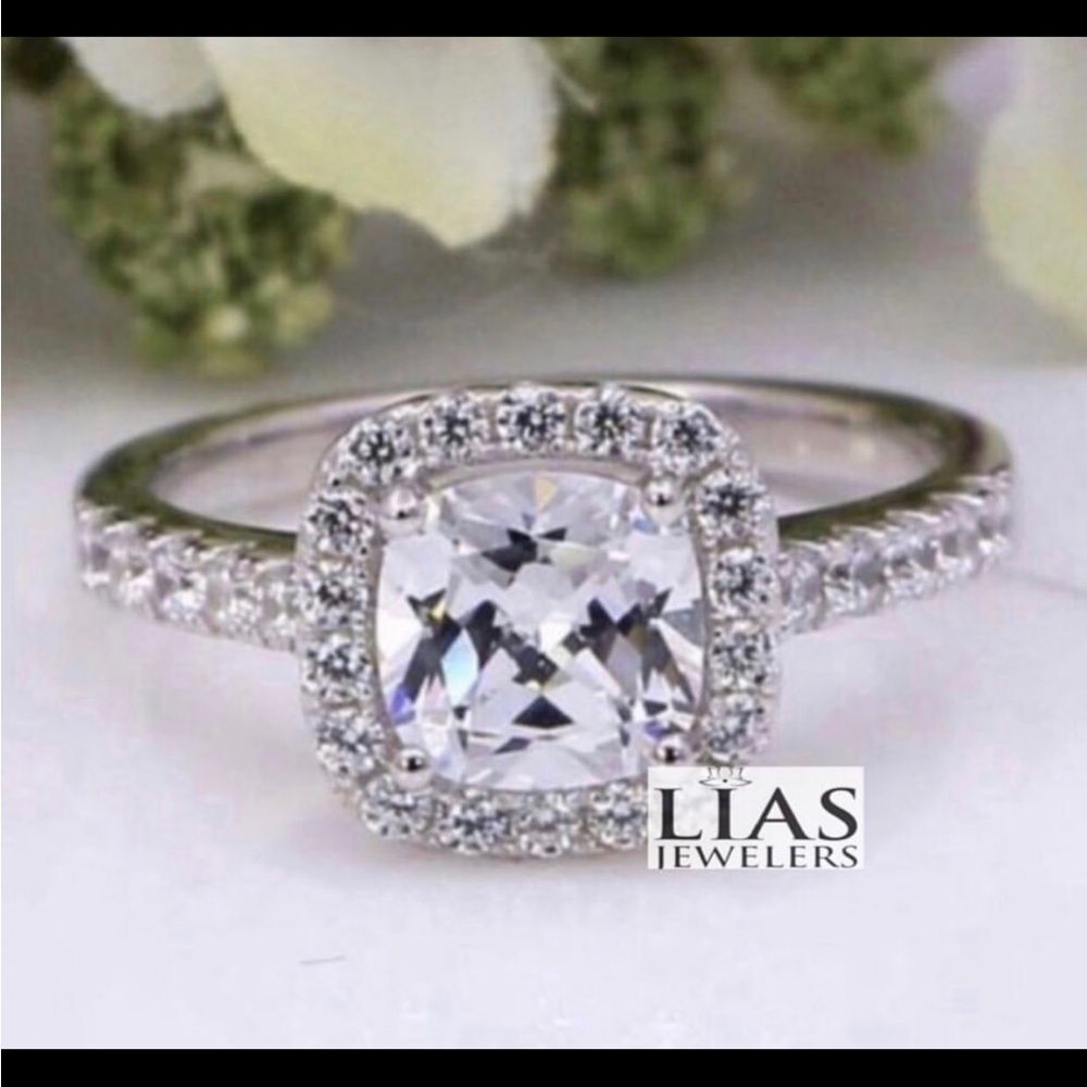New 18k white gold engagement ring